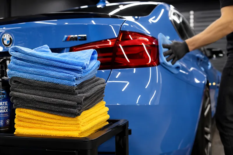 micro fiber towels next to a BMW M3